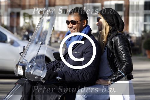 Amsterdam 11 maart 2012
Ruud en Estelle Gullit op Vespa Scooter.
Peter Smulders bv