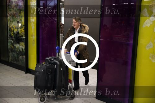 Schiphol 17 maart 2013
Badr Hari en Estelle Cruijff  komen terug van de K1 finale in Zagreb waar Badr zijn voet gebroken heeft . Badr wordt in een rolstoel naar zijn auto gebracht. Albert den Ieseger
Peter Smulders bv