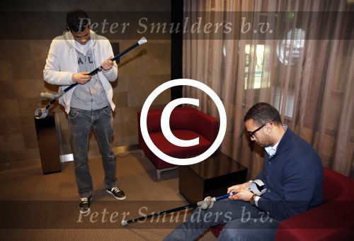 Schiphol 17 maart 2013
Badr Hari en Estelle Cruijff  komen terug van de K1 finale in Zagreb waar Badr zijn voet gebroken heeft . Badr wordt in een rolstoel naar zijn auto gebracht.
Peter Smulders bv