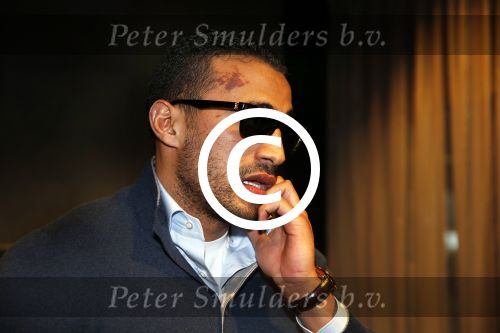 Schiphol 17 maart 2013
Badr Hari en Estelle Cruijff  komen terug van de K1 finale in Zagreb waar Badr zijn voet gebroken heeft . Badr wordt in een rolstoel naar zijn auto gebracht.
Peter Smulders bv