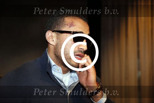 Schiphol 17 maart 2013
Badr Hari en Estelle Cruijff  komen terug van de K1 finale in Zagreb waar Badr zijn voet gebroken heeft . Badr wordt in een rolstoel naar zijn auto gebracht.
Peter Smulders bv
