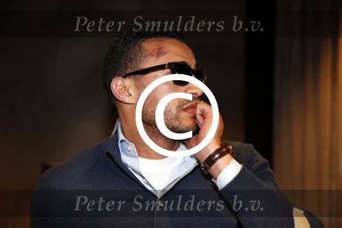 Schiphol 17 maart 2013
Badr Hari en Estelle Cruijff  komen terug van de K1 finale in Zagreb waar Badr zijn voet gebroken heeft . Badr wordt in een rolstoel naar zijn auto gebracht.
Peter Smulders bv