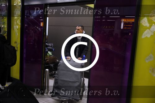 Schiphol 17 maart 2013
Badr Hari en Estelle Cruijff  komen terug van de K1 finale in Zagreb waar Badr zijn voet gebroken heeft . Badr wordt in een rolstoel naar zijn auto gebracht. zwager Badr
Peter Smulders bv
