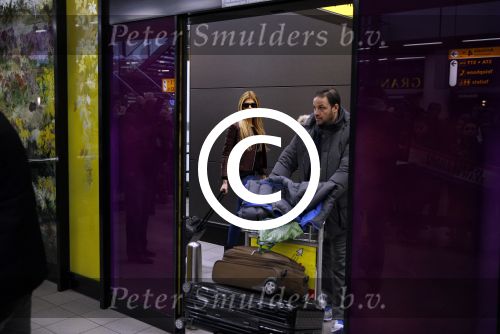 Schiphol 17 maart 2013
Badr Hari en Estelle Cruijff  komen terug van de K1 finale in Zagreb waar Badr zijn voet gebroken heeft . Badr wordt in een rolstoel naar zijn auto gebracht.
Peter Smulders bv