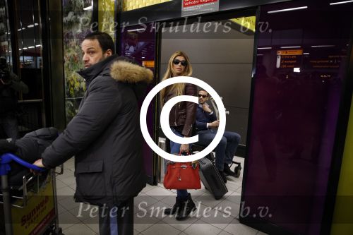 Schiphol 17 maart 2013
Badr Hari en Estelle Cruijff  komen terug van de K1 finale in Zagreb waar Badr zijn voet gebroken heeft . Badr wordt in een rolstoel naar zijn auto gebracht.
Peter Smulders bv
