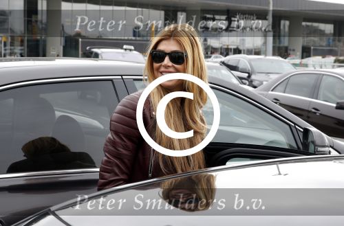 Schiphol 17 maart 2013
Badr Hari en Estelle Cruijff  komen terug van de K1 finale in Zagreb waar Badr zijn voet gebroken heeft . Badr wordt in een rolstoel naar zijn auto gebracht.
Peter Smulders bv