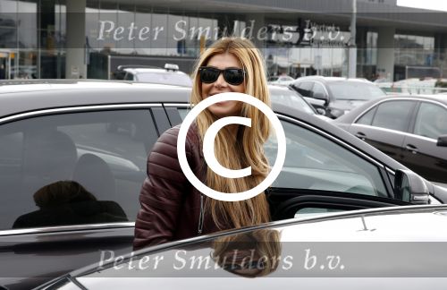 Schiphol 17 maart 2013
Badr Hari en Estelle Cruijff  komen terug van de K1 finale in Zagreb waar Badr zijn voet gebroken heeft . Badr wordt in een rolstoel naar zijn auto gebracht.
Peter Smulders bv
