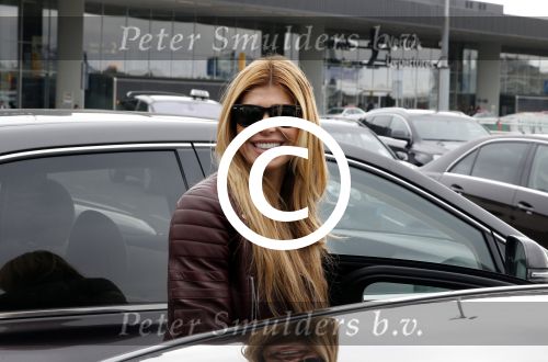 Schiphol 17 maart 2013
Badr Hari en Estelle Cruijff  komen terug van de K1 finale in Zagreb waar Badr zijn voet gebroken heeft . Badr wordt in een rolstoel naar zijn auto gebracht.
Peter Smulders bv
