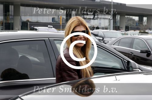 Schiphol 17 maart 2013
Badr Hari en Estelle Cruijff  komen terug van de K1 finale in Zagreb waar Badr zijn voet gebroken heeft . Badr wordt in een rolstoel naar zijn auto gebracht.
Peter Smulders bv