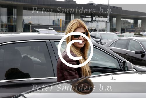 Schiphol 17 maart 2013
Badr Hari en Estelle Cruijff  komen terug van de K1 finale in Zagreb waar Badr zijn voet gebroken heeft . Badr wordt in een rolstoel naar zijn auto gebracht.
Peter Smulders bv