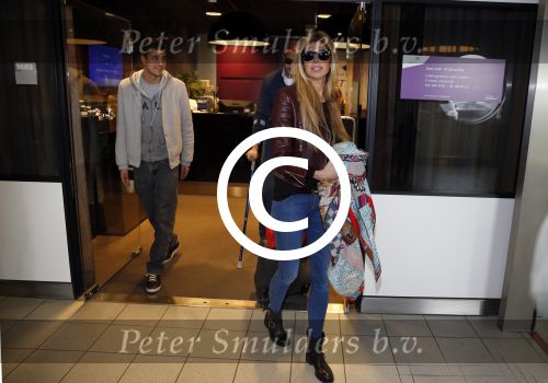 Schiphol 17 maart 2013
Badr Hari en Estelle Cruijff  komen terug van de K1 finale in Zagreb waar Badr zijn voet gebroken heeft . Badr wordt in een rolstoel naar zijn auto gebracht.
Peter Smulders bv