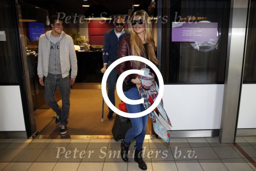 Schiphol 17 maart 2013
Badr Hari en Estelle Cruijff  komen terug van de K1 finale in Zagreb waar Badr zijn voet gebroken heeft . Badr wordt in een rolstoel naar zijn auto gebracht.
Peter Smulders bv
