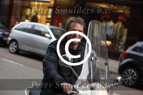 Amsterdam 8 maart 2013
Nicky v Dam op vespa scooter op de pc hooftstraat.
Peter Smulders bv