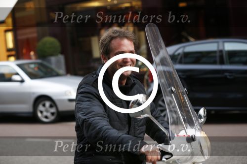 Amsterdam 8 maart 2013
Nicky v Dam op vespa scooter op de pc hooftstraat.
Peter Smulders bv