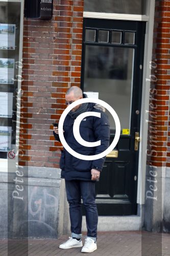 Amsterdam 17 februari 2015
Jeroen v Koningsbrugge met gsm / mobieltje op straat