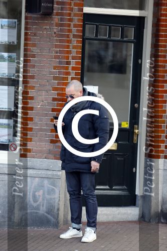 Amsterdam 17 februari 2015
Jeroen v Koningsbrugge met gsm / mobieltje op straat