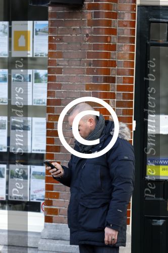 Amsterdam 17 februari 2015
Jeroen v Koningsbrugge met gsm / mobieltje op straat