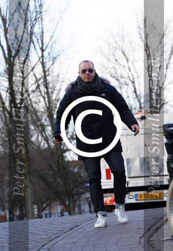 Amsterdam 17 februari 2015
Jeroen v Koningsbrugge met gsm / mobieltje op straat