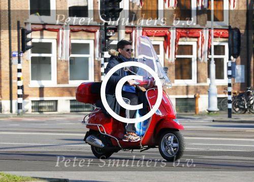Amsterdam 13 februari 2015
Martijn Krabbe op zijn rode vespa scooter