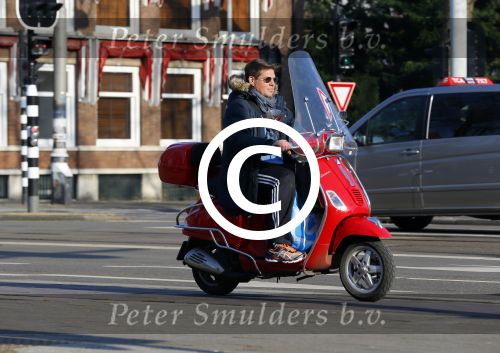 Amsterdam 13 februari 2015
Martijn Krabbe op zijn rode vespa scooter