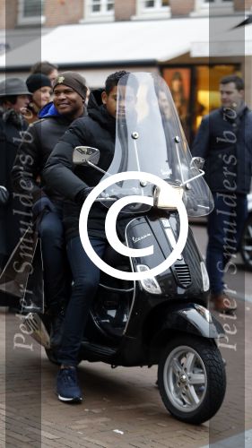 Amnsterdam 13 februari 2016 
Roue Verveer bij zijn zoon achter op de vespa scooter