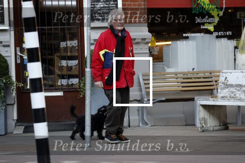 Amsterdam 23 februari 2018 
John v d Rest wandelend met zijn hond
