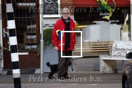Amsterdam 23 februari 2018 
John v d Rest wandelend met zijn hond