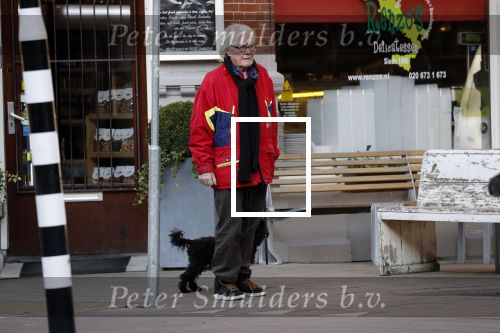 Amsterdam 23 februari 2018 
John v d Rest wandelend met zijn hond
