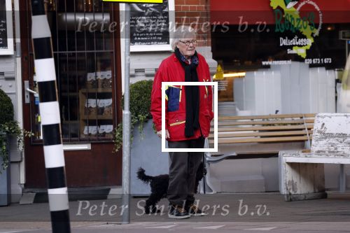 Amsterdam 23 februari 2018 
John v d Rest wandelend met zijn hond