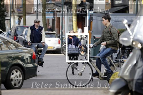 Amsterdam 5 maart 2018 
Patrick Stoof met zijn dochter op de fiets in Amsterdam