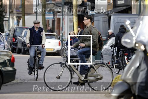 Amsterdam 5 maart 2018 
Patrick Stoof met zijn dochter op de fiets in Amsterdam