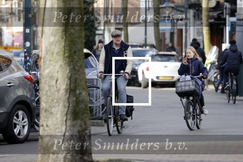 Amsterdam 5 maart 2018 
Patrick Stoof met zijn dochter op de fiets in Amsterdam