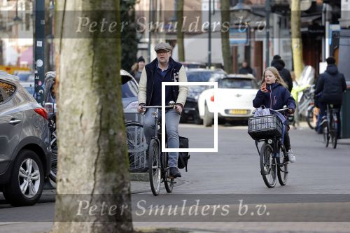 Amsterdam 5 maart 2018 
Patrick Stoof met zijn dochter op de fiets in Amsterdam