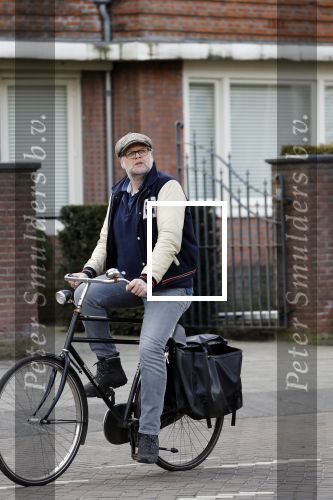 Amsterdam 5 maart 2018 
Patrick Stoof met zijn dochter op de fiets in Amsterdam