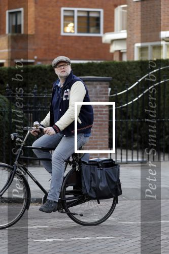 Amsterdam 5 maart 2018 
Patrick Stoof met zijn dochter op de fiets in Amsterdam
