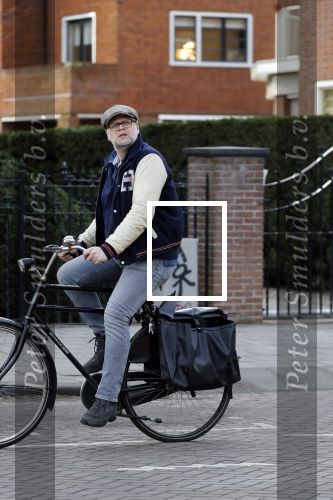 Amsterdam 5 maart 2018 
Patrick Stoof met zijn dochter op de fiets in Amsterdam