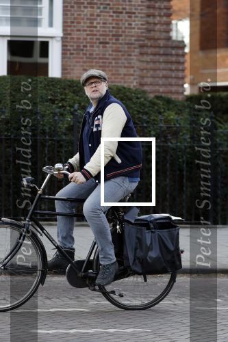 Amsterdam 5 maart 2018 
Patrick Stoof met zijn dochter op de fiets in Amsterdam