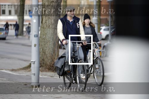 Amsterdam 5 maart 2018 
Patrick Stoof met zijn dochter op de fiets in Amsterdam