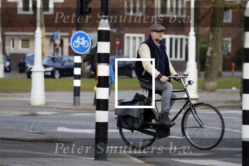 Amsterdam 5 maart 2018 
Patrick Stoof met zijn dochter op de fiets in Amsterdam