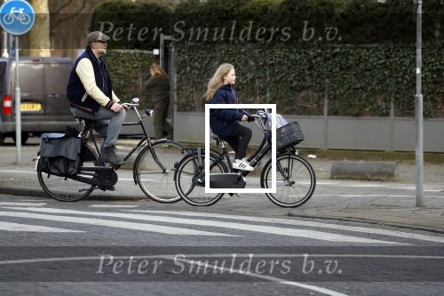 Amsterdam 5 maart 2018 
Patrick Stoof met zijn dochter op de fiets in Amsterdam