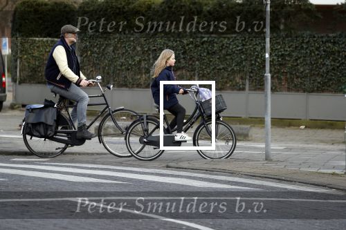 Amsterdam 5 maart 2018 
Patrick Stoof met zijn dochter op de fiets in Amsterdam