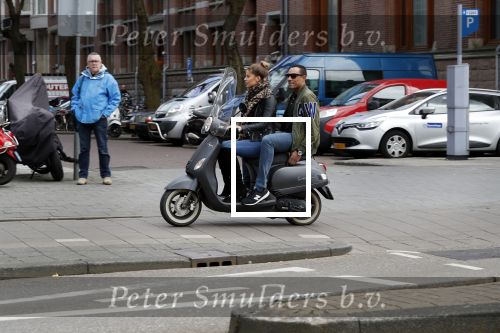 Amsterdam 12 maart 2018
Stephanie Tency met haar compagnon op de scooter