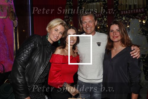 Amsterdam 14 februari 2019
Feestje voor de kluivert dog rescue foundation in het toppers cafe. Dierenarts van SBS6 Piet Hellemans met vrouw Rosanna Kluivert en Anopuk Smulders.