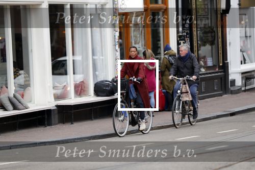 Amsterdam 25 januari 2020
Guus Hiddink met zijn vriendin op de fiets in Amsterdam.