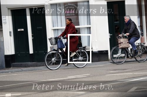 Amsterdam 25 januari 2020
Guus Hiddink met zijn vriendin op de fiets in Amsterdam.