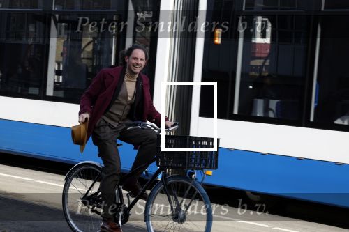 Amsterdam 15 februari 2022
Edwin Oudshoorn met hoed op de fiets in Amsterdam