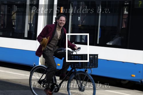 Amsterdam 15 februari 2022
Edwin Oudshoorn met hoed op de fiets in Amsterdam