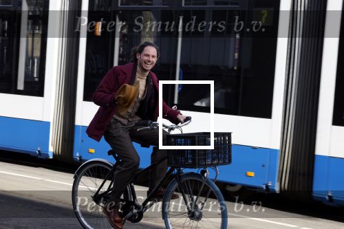 Amsterdam 15 februari 2022
Edwin Oudshoorn met hoed op de fiets in Amsterdam