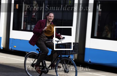 Amsterdam 15 februari 2022
Edwin Oudshoorn met hoed op de fiets in Amsterdam