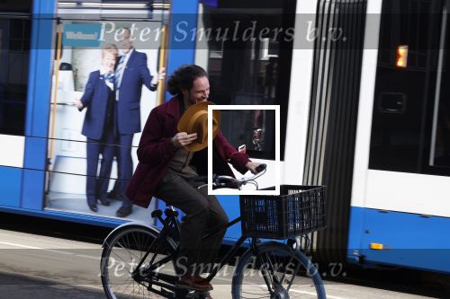 Amsterdam 15 februari 2022
Edwin Oudshoorn met hoed op de fiets in Amsterdam